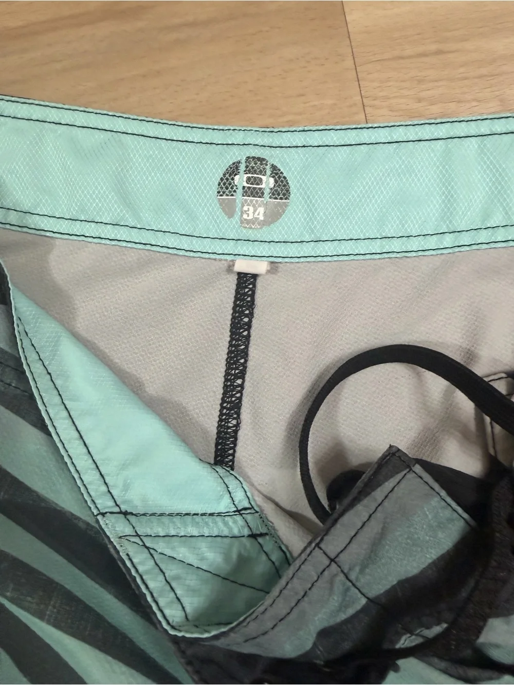 Oakley Black & Aqua Striped Board Shorts